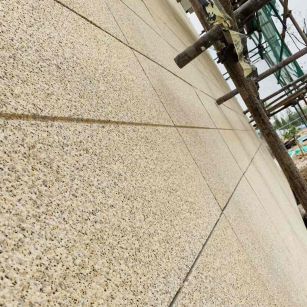 长沙 黄金麻花岗岩荔枝面外墙干挂石材效果示例