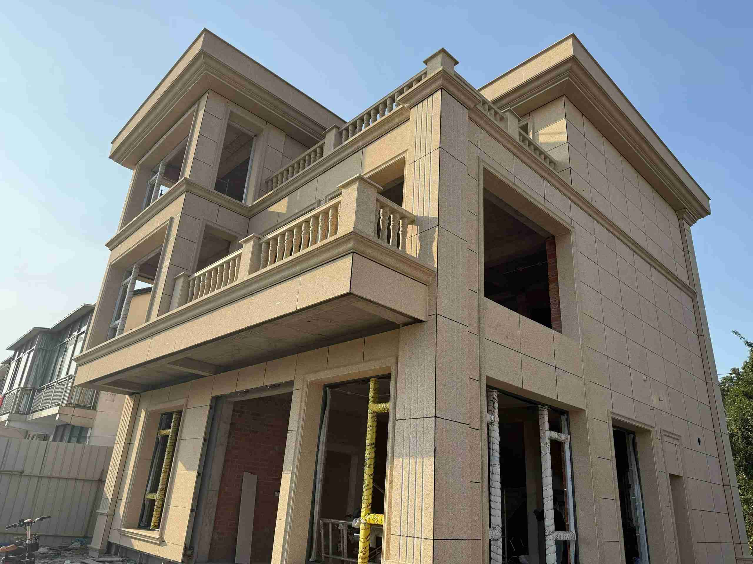 长沙 黄金麻花岗岩石材荔枝面外墙干挂效果展示