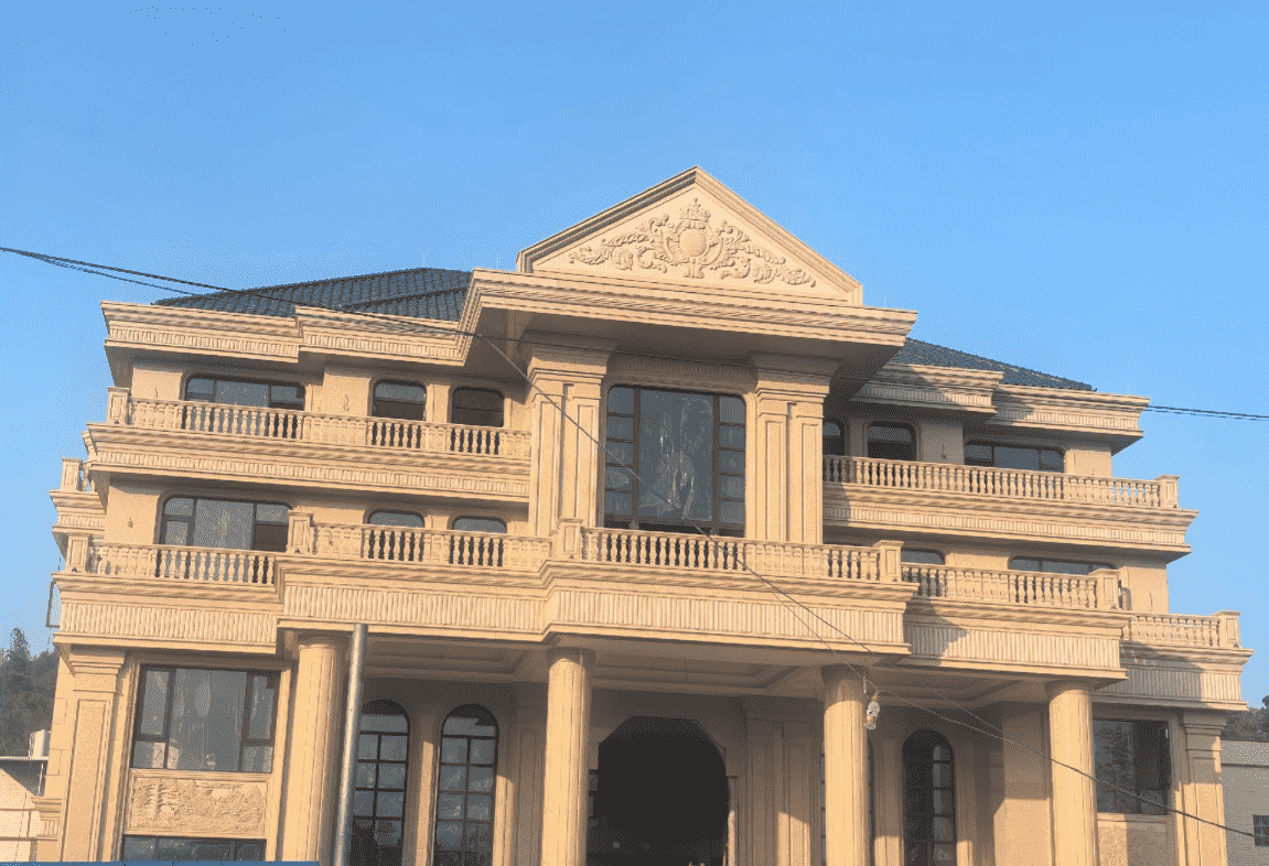 长沙黄金麻别墅外墙干挂石材效果示例